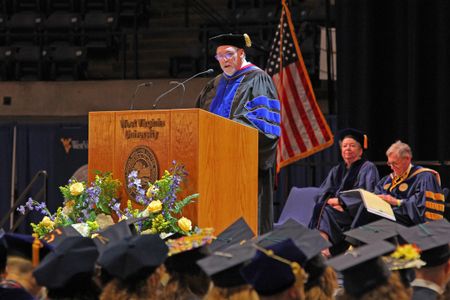 Dean Dunaway addresses the crowd of graduates